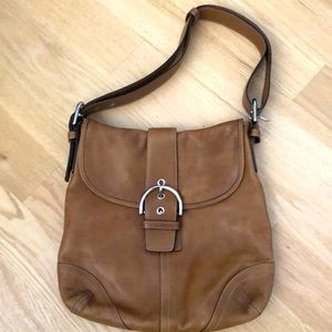Coach purse- over the shoulder- adjustable strap. Model G3S-9481 lovely brown.